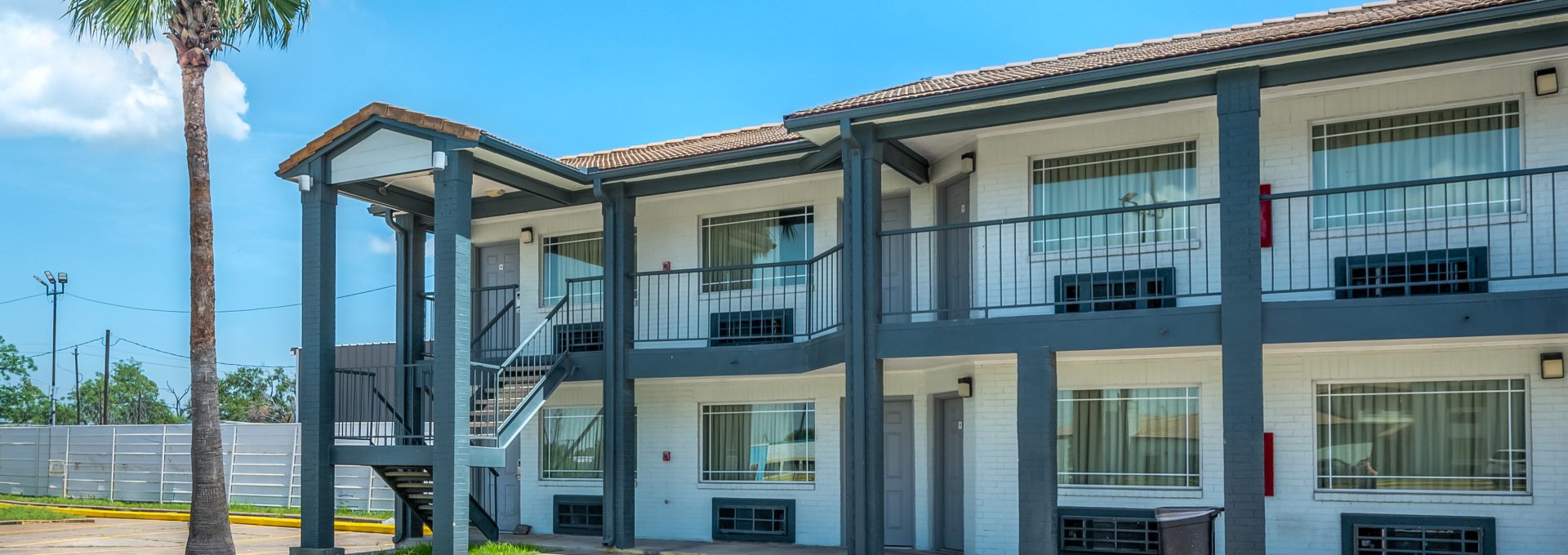 the motel is located in the parking lot of a hotel at The  Studios At Channelview